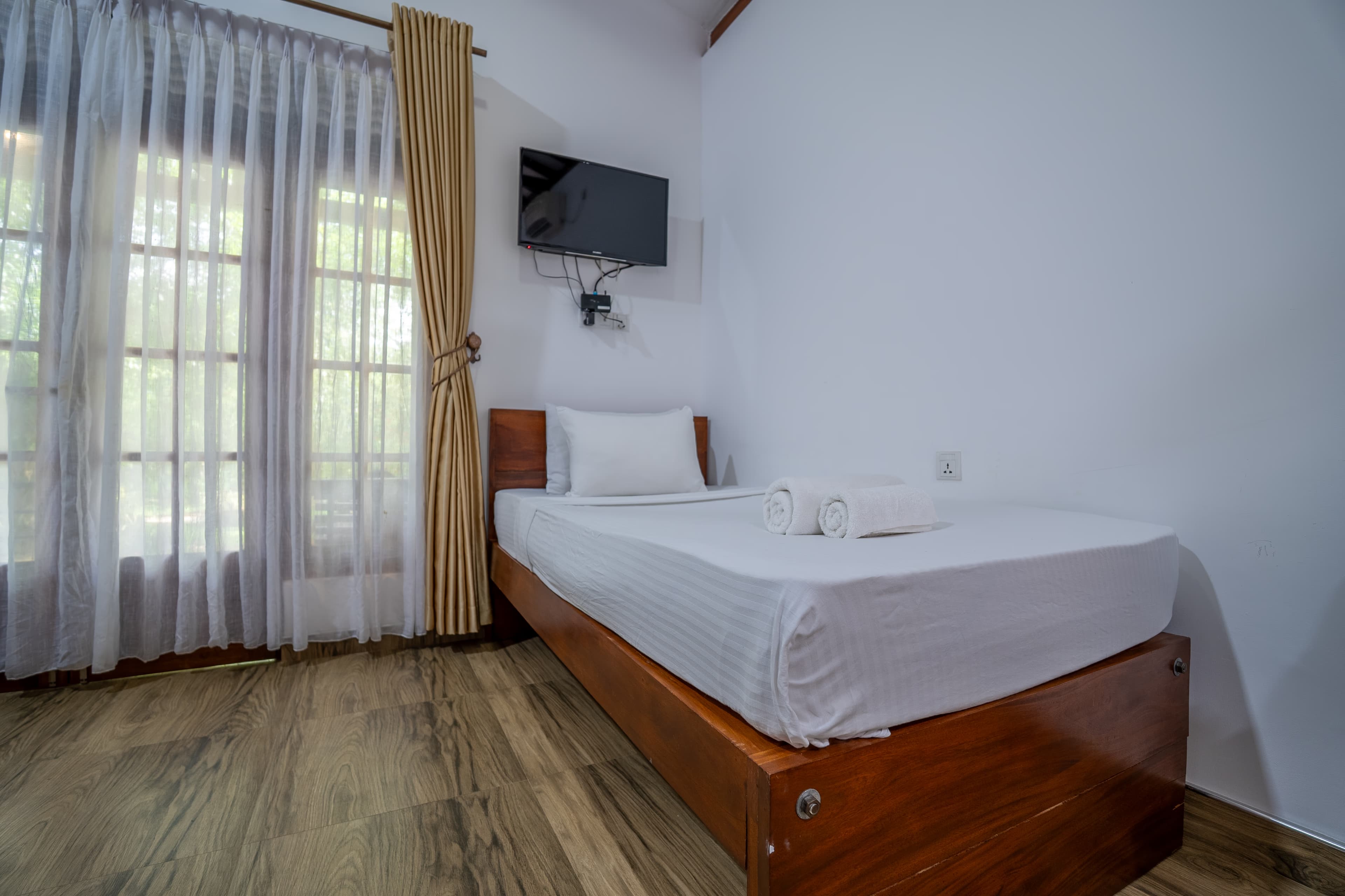 Deluxe Triple Room with Balcony view 1